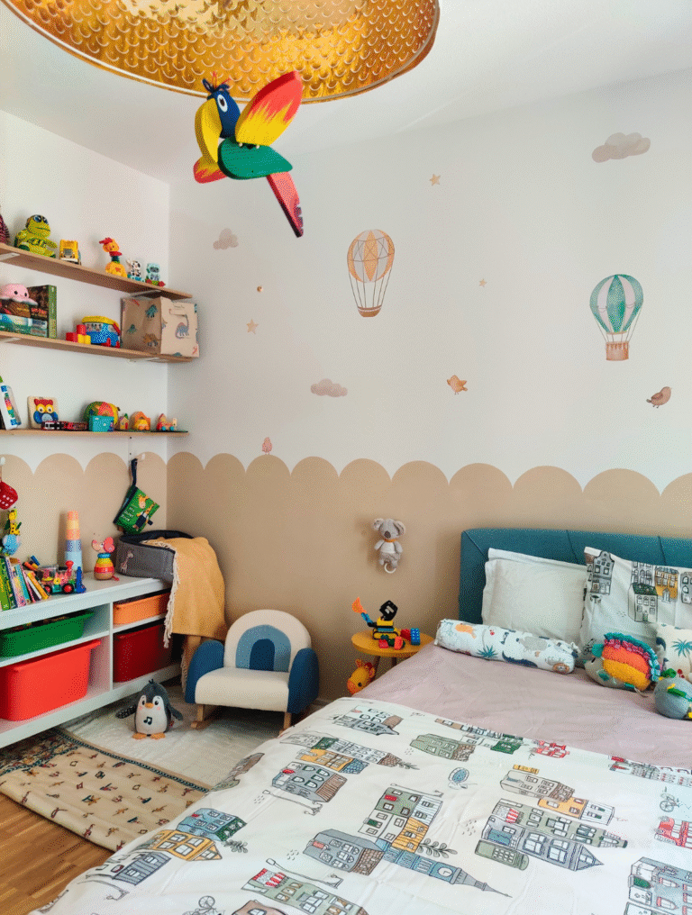 Interior design of a modern children’s bedroom in Germany featuring pastel tones, cozy textiles, smart storage, and playful decor. Designed by Ishi Design Co.